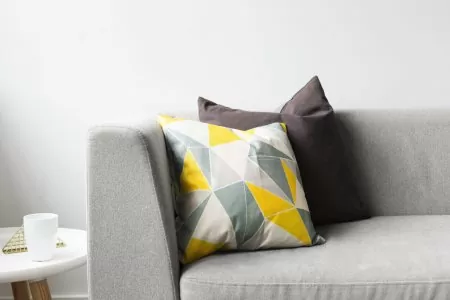 Modern grey couch and pillows